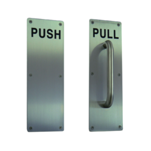 Standard door handles on a white background. The left is a backplate with the word 'Push' on it, while the right is a backplate with the word 'Pull' and a handle sticking out.